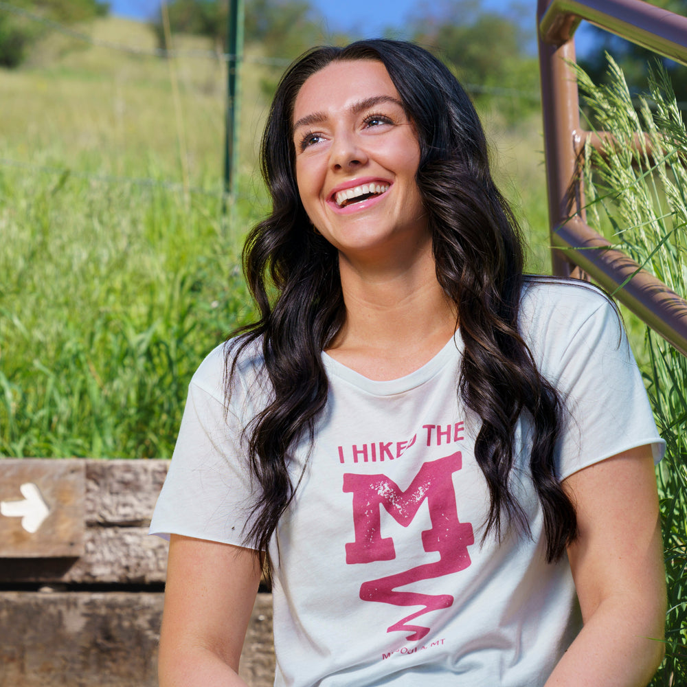 
                  
                    Hike The "M" Women's Festival Crop Tee
                  
                